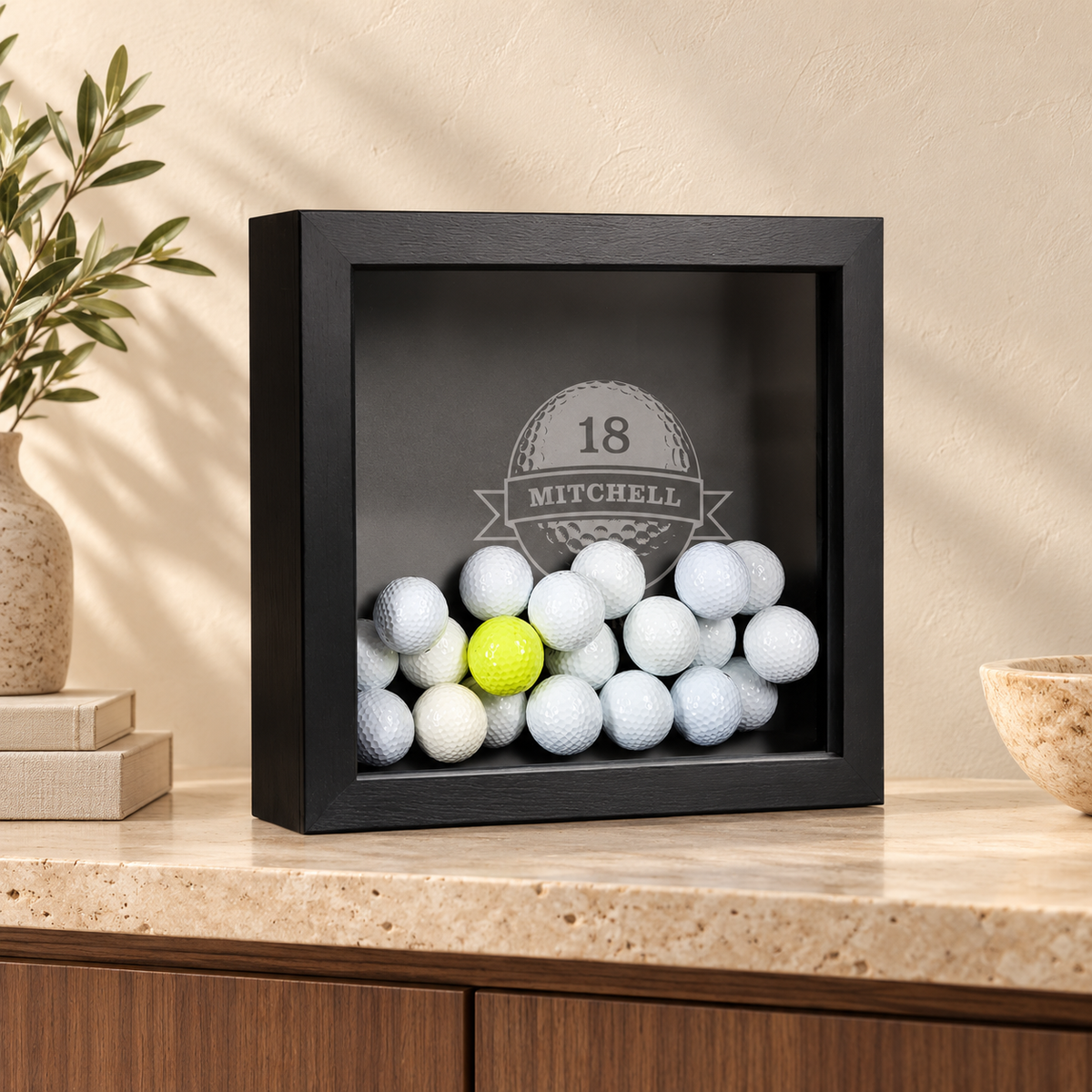 Personalized Golf Ball Display in a warm interior; example personalization
