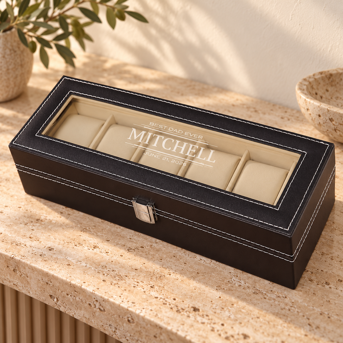 Personalized Leather Watch Case in a warm interior; example personalization